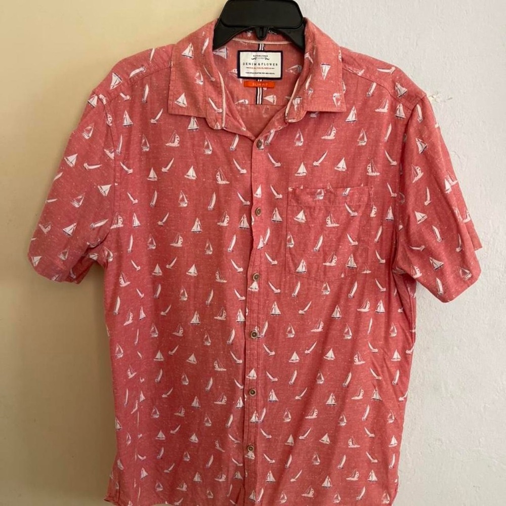 Red bottom down shirt with white ⛵️.